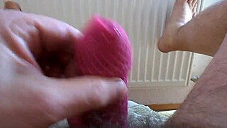 Fishnet socks mask pink and cum on a cock