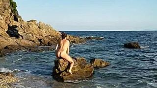 Walking Naked On Public Beach With Pebbles Insertion