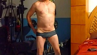 Erotic dance show by a male youth mostly until he gets nake