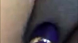 Beautiful woman squirts while pleasuring herself with a toy.