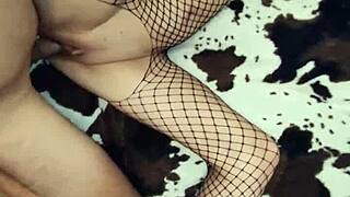 A milf in fishnet lingerie gets her ass fucked and stretched