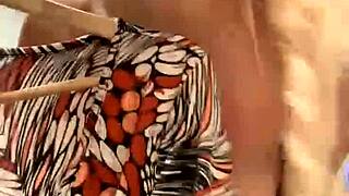 Blonde bombshell undresses and engages in dirty talk