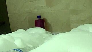 Male cosplayer Cyno has a solo bath time in a foam bath