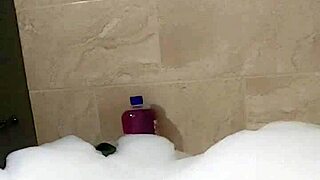 Male cosplayer Cyno has a solo bath time in a foam bath