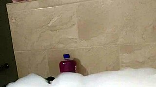 Male cosplayer Cyno has a solo bath time in a foam bath