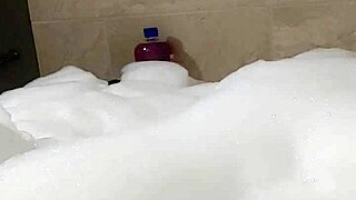 Male cosplayer Cyno has a solo bath time in a foam bath