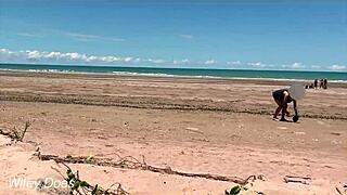 Wife strips nude to play football at public clothed beach, wanna join?