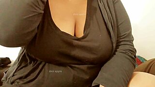 Big-boobed woman exposes breasts to her male sibling