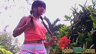 Tobie the teen enjoys solo outdoor pleasure and finger her sweet spot