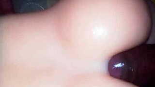 Black beauty gets her hole filled with silicone toy