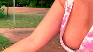 Public exhibitionist wife shows her big cans while riding a bike