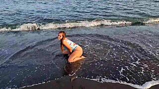 Beautiful teenager enjoys outdoor sex on the beach