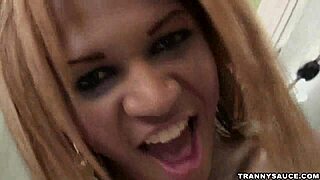 Brunette shemale masturbates solo before sucking hard cock