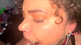 Beautiful amateur with curly hair gets a facial with a big black cock