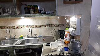 Estefani strips and makes pancakes in this porn video