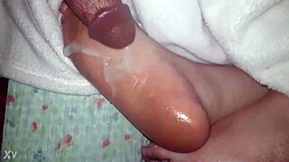 Oiled feet and toes covered with cum shot