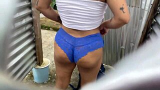 A girl recorded a video of herself in an outdoor booth