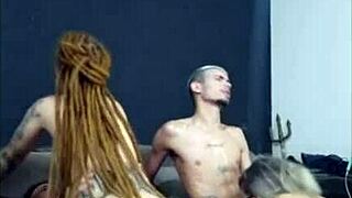 A daring girl in dreadlocks enjoyed herself with friend
