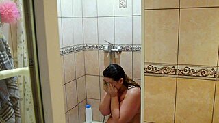 A hot chubby MILF showers, showing raw beauty