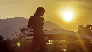 Monika’s hot body shines in sunset pool shot