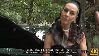 Wow, this mature brunette in heels lured a young guy for public sex in the woods 😍