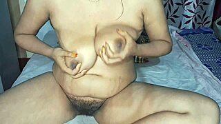 Ever seen a hot Indian desi bhabhi tease her hairy pussy?