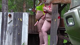 Mature lesbians flash big asses outdoors in lingerie. Voyeur watches with hidden camera in public park fetish scene.