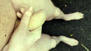 Risky outdoor masturbation at midday with a huge cock in public view