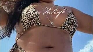 Puta casada showing off huge ass in tiny bikini at the beach with tan lines
