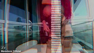 busty redhead teasing on public balcony, damn!