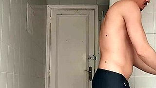 Sexy Guy Shaving in Black Beach Shorts