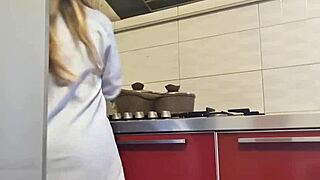 gostosa cleans the stove and gets really hot while doing it, feeling the warmth build up inside her